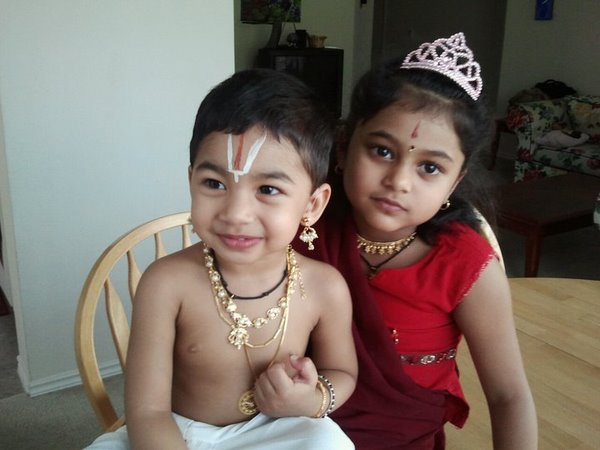 My son dressed as Lord Krishna and my daughter as the Gopika...